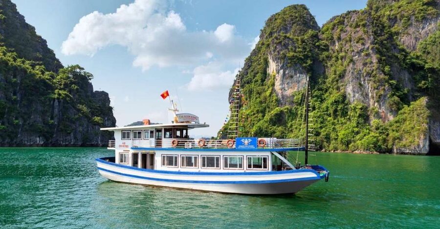 Hanoi: Halong Bay Day Trip with Titop Island, Cave, & Kayak - Boarding the boat and finding your rhythm