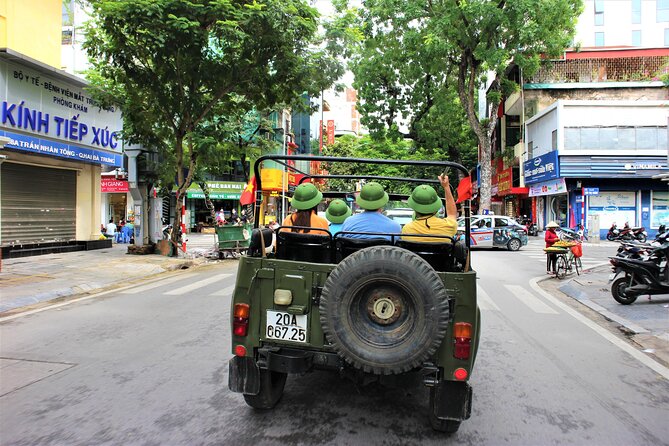 Hanoi Jeep Tours Led By Women: Hanoi City Jeep Tours - Hom Market and the road to Long Bien Bridge