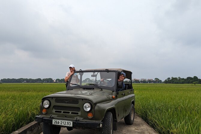 Hanoi Jeep Tours Led By Women: Hanoi Countryside Jeep Tours - Long Bien Bridge: Hanoi’s first change of scene