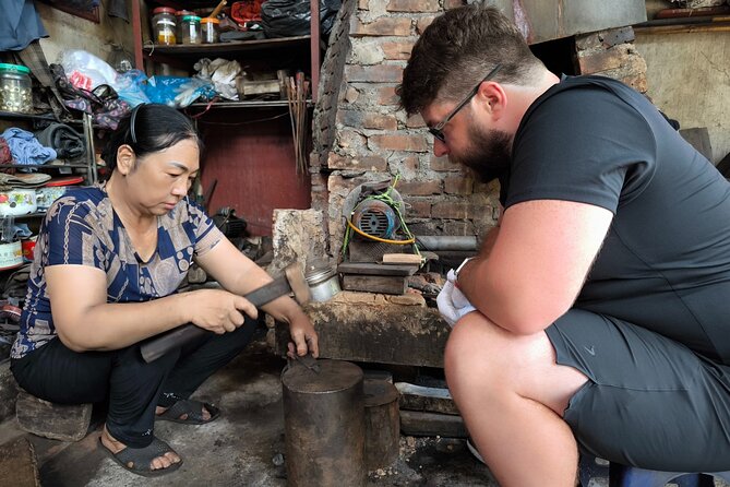 Hanoi Knife Making Traditional Workshop - Sharpening on the grindstone