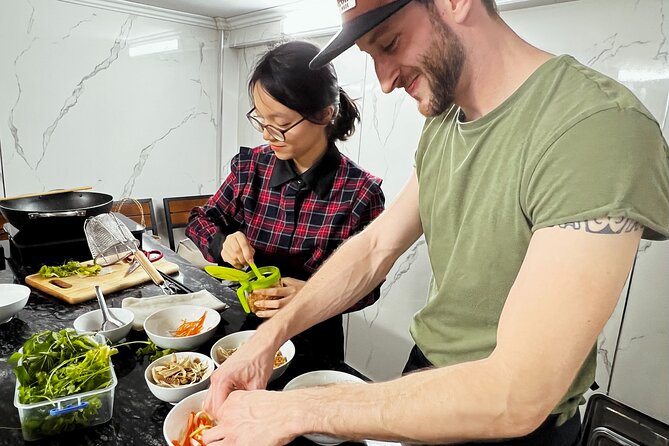 Hanoi Maya Kitchen: Traditional Cooking Class & Market Tour - Balancing sour and sweet in papaya salad