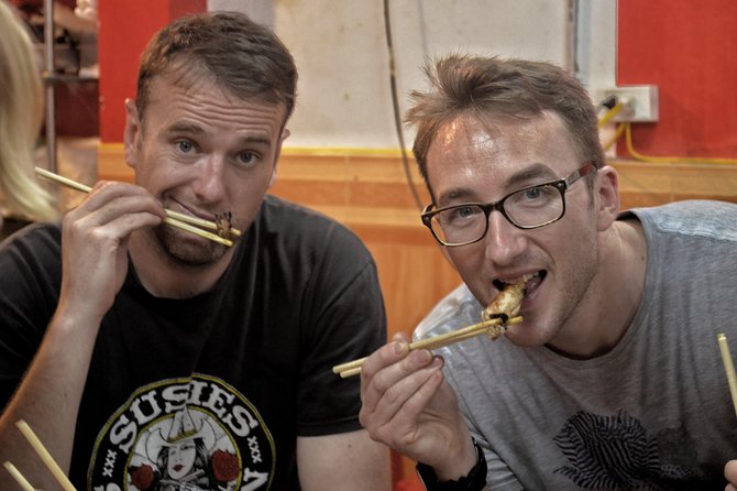 Hanoi Michelin Star Walking Food Tour & Train Street - A food walk that ends with a train rolling past