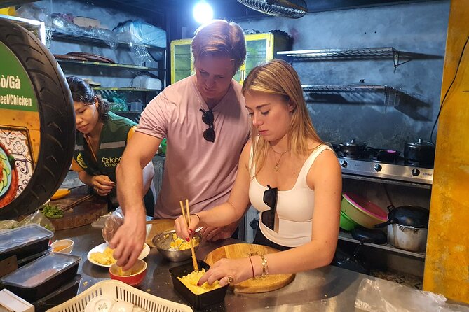 Hanoi Michelin Star Walking Food Tour & Train Street - Making spring rolls instead of only watching