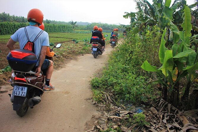 Hanoi Motorbike Tours Led By Women: Hanoi City Insight Motorbike Tours - Huu Tiep Lake and the downed B-52