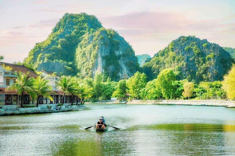 Hanoi: Ninh Binh, Tam Coc, Mua Cave & Hoa Lu with cycling - Tam Coc by riverboat