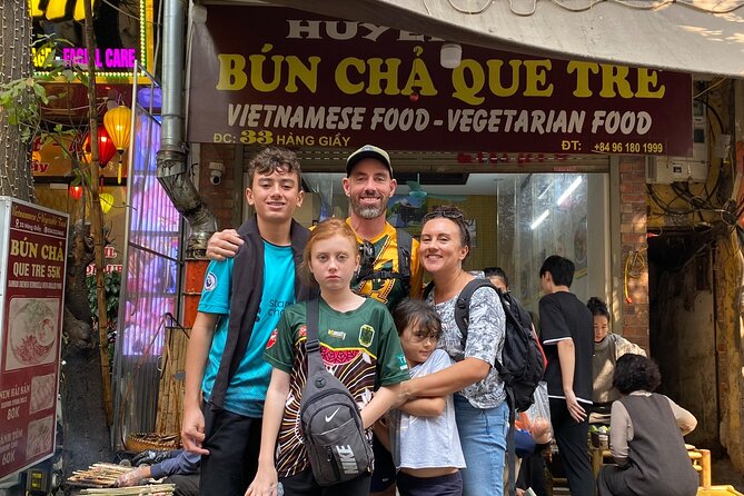 Hanoi Private Walking Street Food Tour with Train Street Visit - Walking through Hanoi’s Old Quarter