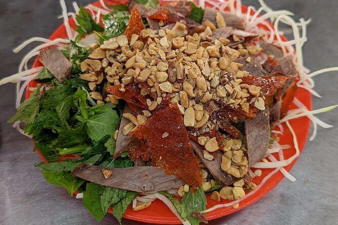 Hanoi Street Food Private Tour - Trying snails, steamed pancakes, and banh mi