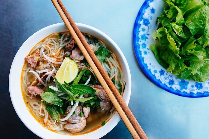 Hanoi Street Food Tour By Motorbike + Sightseeing SAFE & FUN - Bun cha, grilled rolls, and the first taste of Hanoi