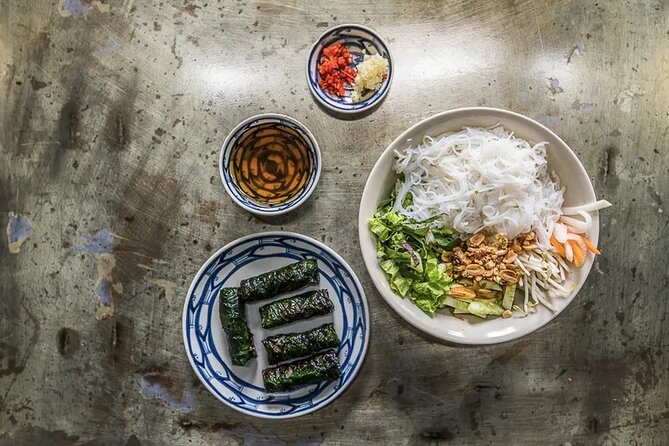 Hanoi Street Food Tour By Motorbike + Sightseeing SAFE & FUN - Steam rice pancakes in the Old Town