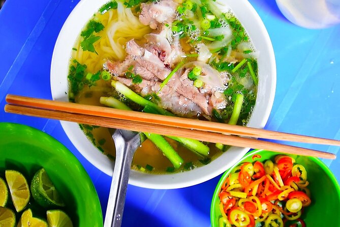 Hanoi street food tour (Private tour) - A railway café beside the active tracks