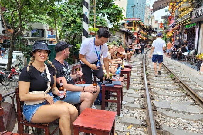 Hanoi street food walking and train street visit - What the guide adds to each bite