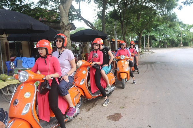 Hanoi Vespa Full Day City & Countryside with Female Ao Dai Riders - Long Bien Bridge and the Red River opening