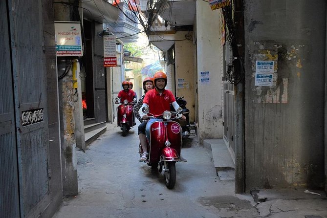 Hanoi Vespa Tours: Hanoi After Dark Vespa Food Tours - Long Bien Bridge gives the evening a strong opening
