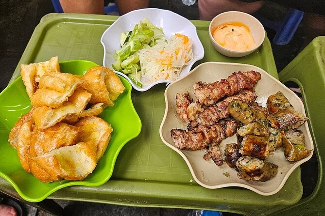 Hanoi Walking Street Food Tour with Train Street - Banh xeo, banh mi, salad, and small-shop eating