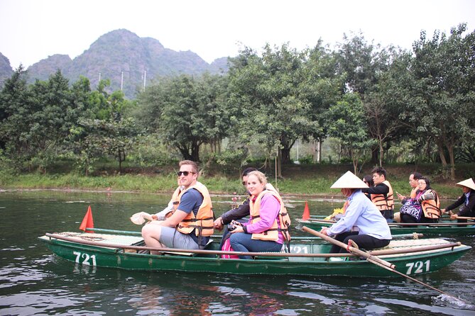 Hidden Ninh Binh Luxury Full Day Group Tour (Tam Coc - Hoa Lu) - Tam Coc by river, the day’s visual center
