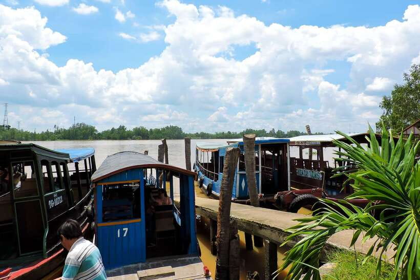 Ho Chi Minh City: Mekong Delta Tour with Sampan Journey - The sampan ride beneath coconut palms