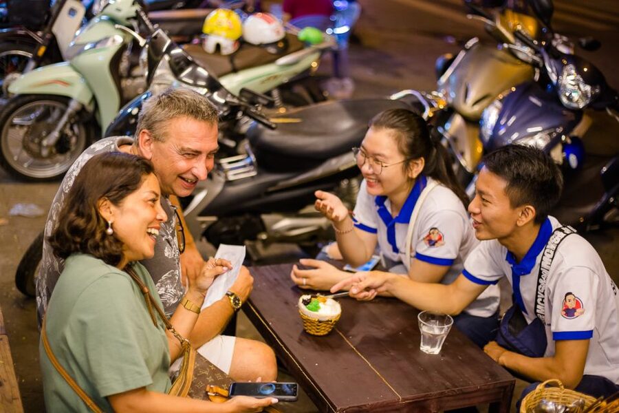 Ho Chi Minh City: Private Street Food Motorbike Tour - Seafood, flan, and banana rice wine in District 4