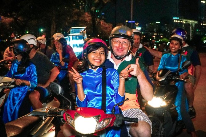 Ho Chi Minh Night Tour by Motorbikes with Female Rider | KissTour - More riding, more food, and a riverfront finish