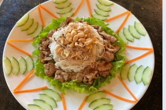 Hoi An: Bay Mau Eco Cooking Tour - Pounding rice and making rice paper