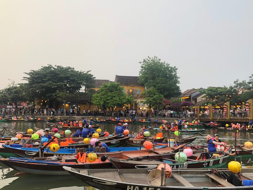 Hoi An Lantern Boat Ride on the Thu Bon River - Lighting the flower lantern and making your wish