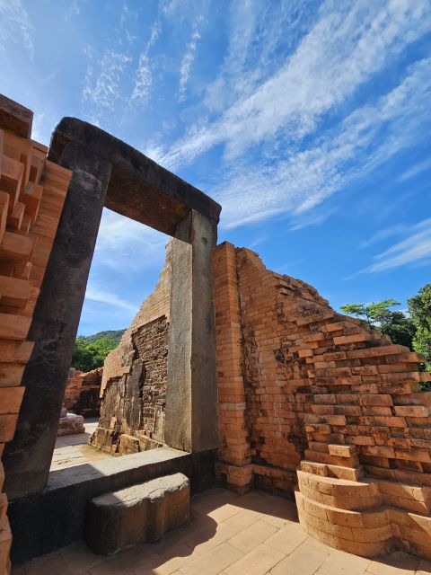 Hoi An: My Son Sanctuary & Sunset River Cruise BBQ or Banhmi - From the ruins to the Thu Bon River