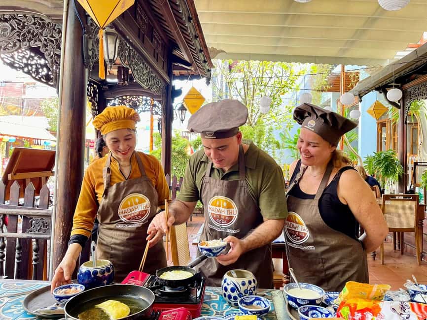 Hue City: Cyclo, Market Tour & Cooking Class at Madam Thu - Crossing the Perfume River by cyclo