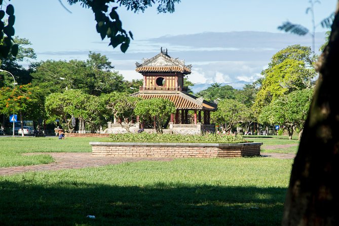Imperial Hue And Hai Van Pass Full-day Tour - A short boat ride on the Perfume River
