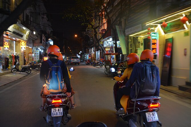 Led By Women - Hanoi Foodie Motorbike Tours - The nighttime West Lake photo stop
