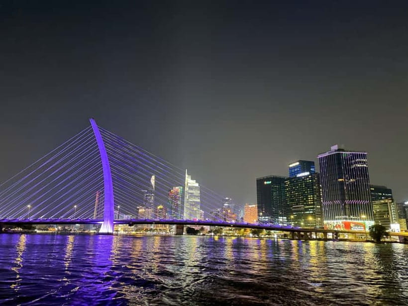 Lively Saigon River Sightseeing Cruise + Guided Walking Tour - Walking toward Bach Dang Pier