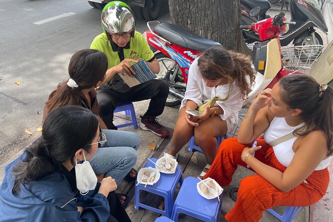 Morning Saigon Unseen Adventure Scooter with Ao Dai Riders Option - Old apartments and Ho Thi Ky Flower Market