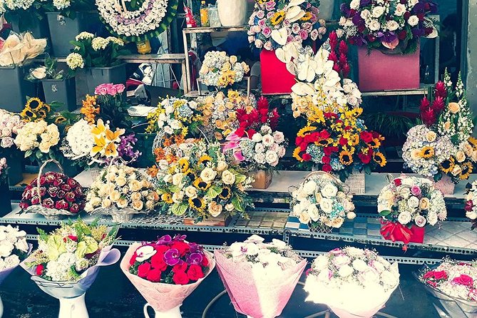 Morning Saigon Unseen+Street Food Tour with Ao Dai Riders Option - Ho Thi Ky Flower Market before the heat builds