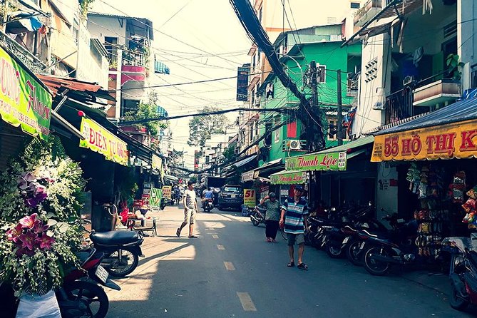 Morning Saigon Unseen+Street Food Tour with Ao Dai Riders Option - Ba Thien Hau Temple in District 5