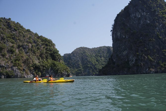 Most favorite full day boat tour with kayaking in Lan Ha bay, Ha Long bay - Swimming at Three Peaches Beach