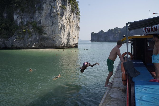 Most favorite full day boat tour with kayaking in Lan Ha bay, Ha Long bay - Kayaking through the Dark-Bright caves