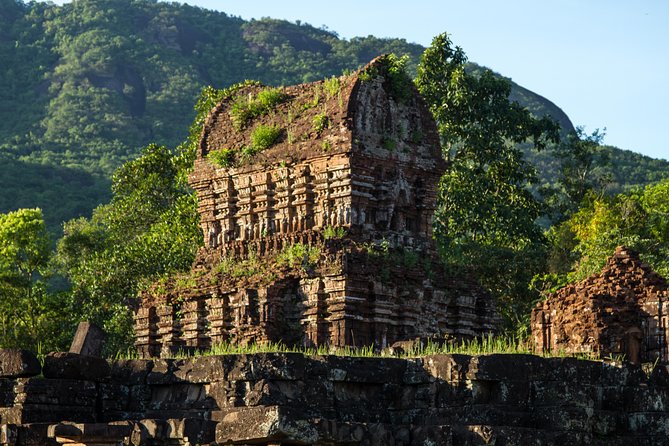 My Son Sanctuary And Hoi An Heritage Full-day Tour - Reading the red-brick towers at My Son
