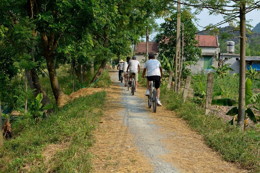 Ninh Binh Daily: Hoa Lu, Mua Cave, Tam Coc, Bike & Swimming - Sunset tea, fruit, and pool time