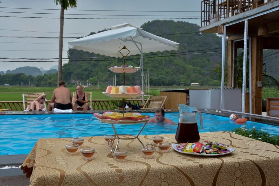 Ninh Binh Daily: Hoa Lu, Mua Cave, Tam Coc, Bike & Swimming - The guides and group atmosphere