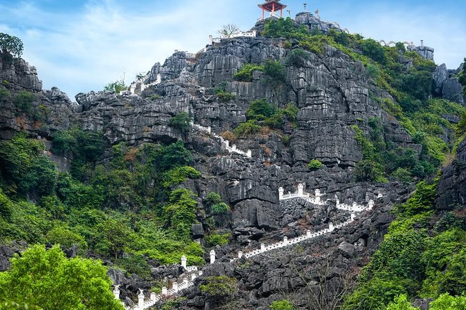 Ninh Binh Daily Tour: Hoa Lu -Mua Cave -Tam Coc- Bike-Swimming with Sunset Party - Cycling through the Ninh Binh countryside