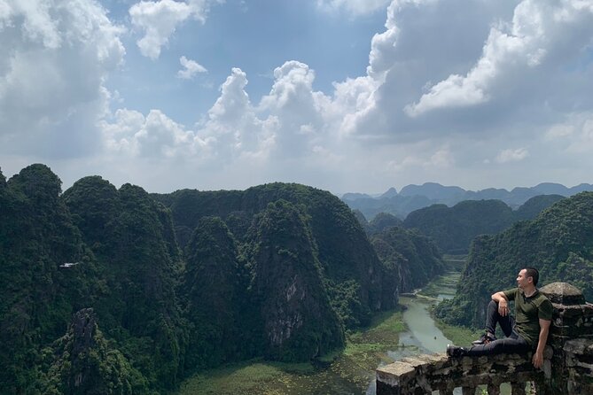 Ninh Binh Group Tour of 11 from Hanoi via Mua Cave Tam Coc Hoa Lu - Cycling through rice fields near Tam Coc