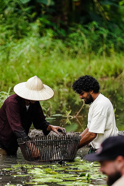 Ninh Binh: Rice planting and fishing by basket tour - Waterfall bathing and Buffalo Cave