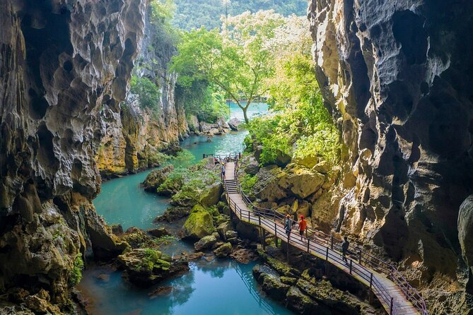 Paradise Cave & Dark Cave All-Inclusive 1-Day - Reaching Paradise Cave by golf cart and foot