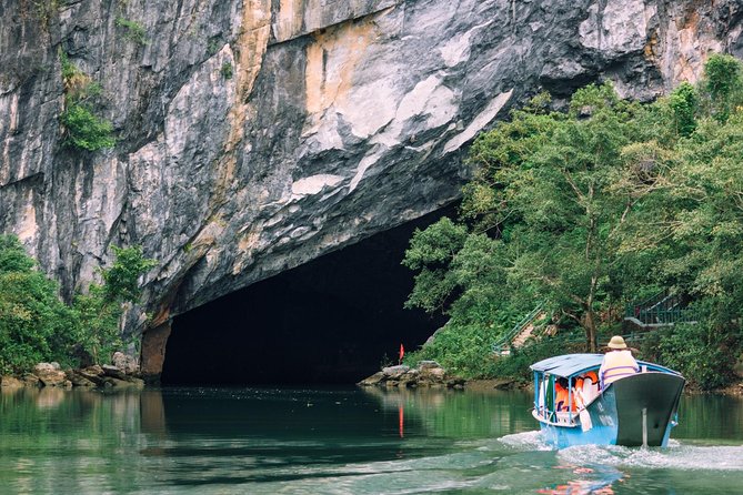 Paradise Cave & Dark Cave Full Day Trip - Transport, group size, and the long day