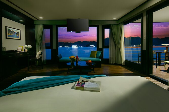 Peony Cruise 5<em> Lan Hạ Bay 2 days 1 night with 2 ways transfer – The morning ride from Hanoi to Tuan Chau’ /></p>
<p><p>The first transfer begins between 8:30 and 8:50. A limousine bus picks you up at your Hanoi hotel in the Old Quarter, or you can meet at No. 34 Hoa Ma in Hai Ba Trung. The cruise departure point is Tuan Chau, near Ha Long Bay.</p>
</p>
<p><p>The two-way transfer is an important part of the package. You do not have to arrange separate transport from Hanoi to the harbor and back again. That saves time and removes one common source of confusion on a short trip.</p>
</p>
<p><p>Still, pay attention to the pickup instructions. One booking found the arrangements unclear until the operator called the day before. I would confirm your hotel address, pickup time, and return plan before departure. If you are not staying in the Old Quarter, check whether you need to reach the Hoa Ma meeting point yourself.</p>
</p>
<p><p>The exact pickup window is short, so be ready before 8:30. A limousine transfer sounds more comfortable than a basic coach, though the supplied details do not specify the vehicle’s seating layout or journey time. You should allow much of the morning for the trip to the harbor.</p>
</p>
<h2 id="boarding-peony-cruise-around-midday">Boarding Peony Cruise around midday</h2>
<p><img width="669" height="446" decoding="async" src=