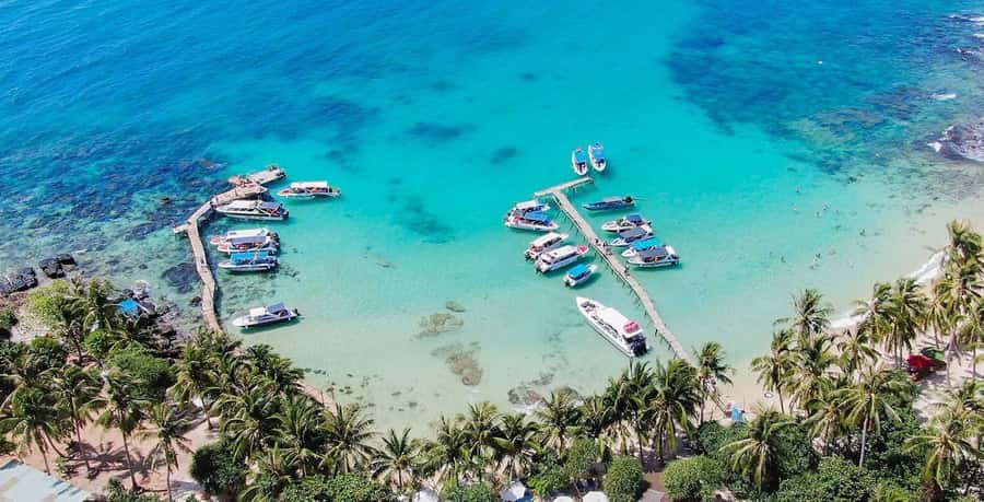 Phu Quoc: 3-Island Tour & Cruise with Lunch & Water Sports - Hon May Rut Ngoai: first swim and photo stop