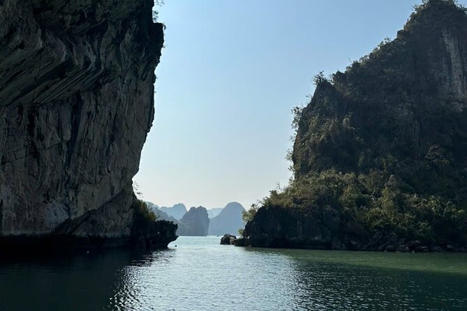 Private 1 Day Tour in Ha Long Bay with Private Cruise or Group - Taking the traditional bamboo boat