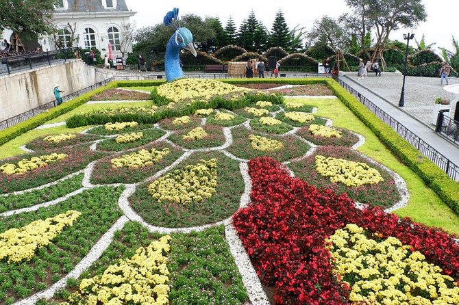 Private guided Sunworld Ba Na Hills & Golden Hands Bridge - French Village, Lunar Castle, and Fantasy Park