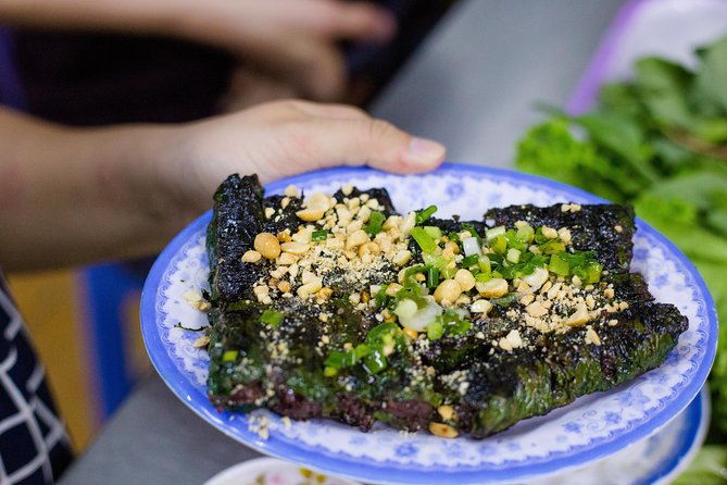Private Street Food Evening Walking Tour in Ho Chi Minh City - Seafood, crab soup, and the courage to try more