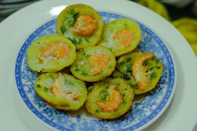 Private Street Food Motorbike Tour in Ho Chi Minh City - District 4: seafood, barbecue, and a final dessert