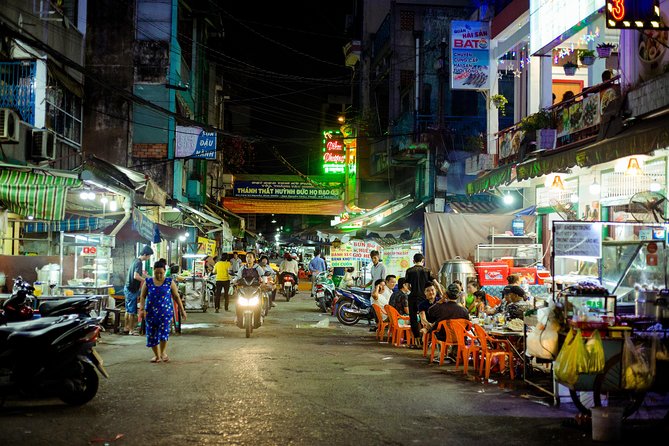 Private Vegan Food Tour By Scooter in Ho Chi Minh City - Vegan banh xeo shows how to eat the food