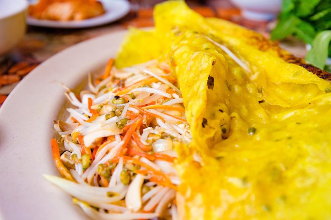 Private Vegan Food Tour By Scooter in Ho Chi Minh City - A 5:30 PM start sets up the evening